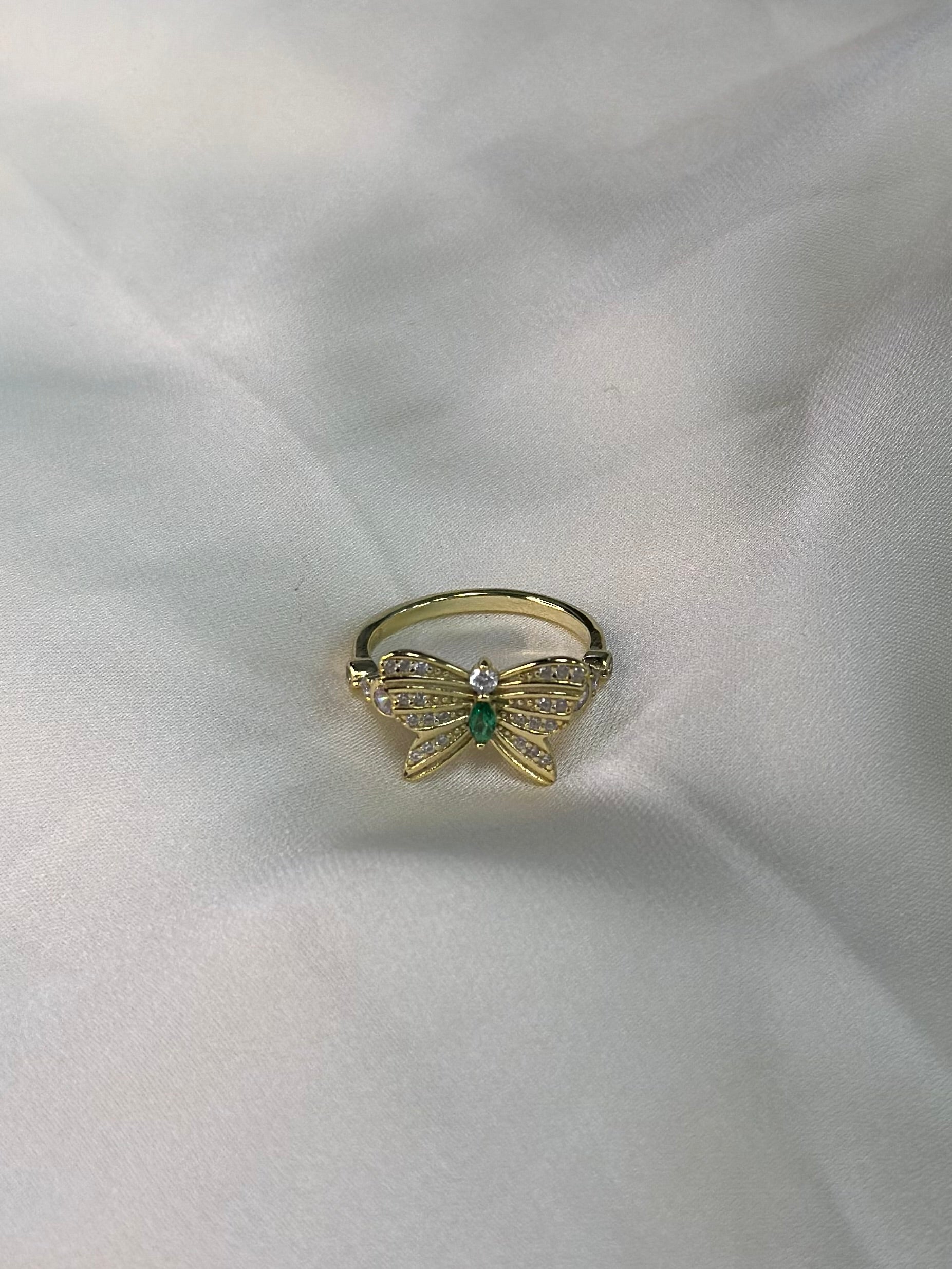 BUTTERFLY RING WITH ZIRCONS AND GREEN STONE